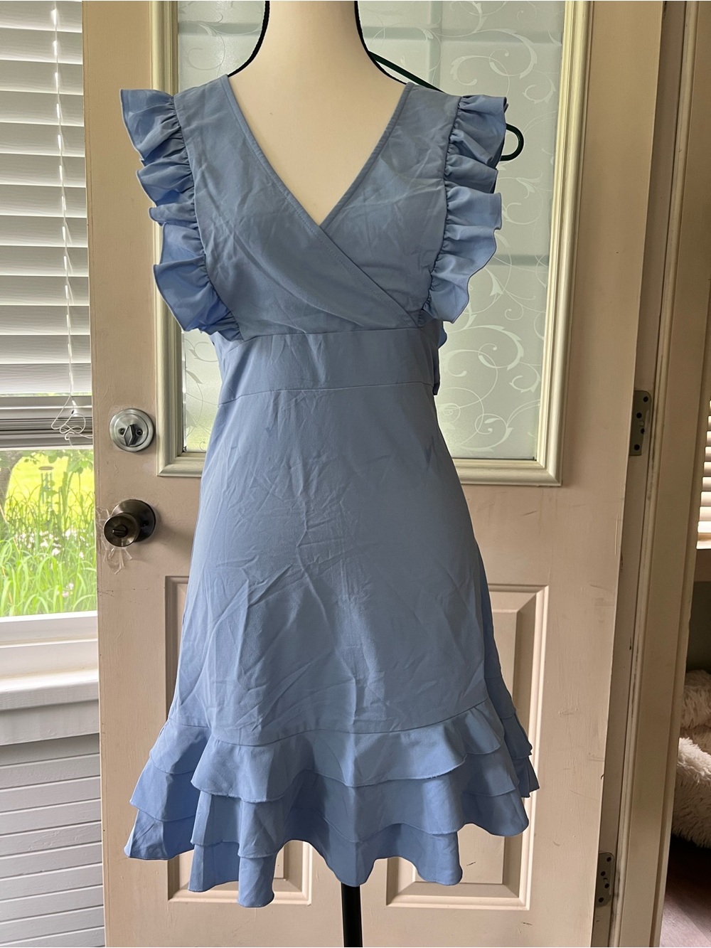 SBetro sz M light blue ruffles v neck,
Tiered hem mini dress with tie split back